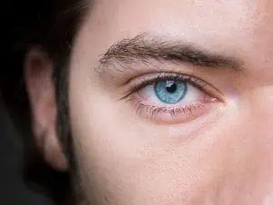 Close up of man's blue eye