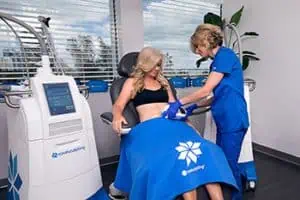 Woman undergoing CoolSculpting treatment