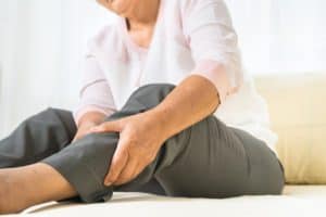 Woman with leg heaviness from chronic venous insufficiency