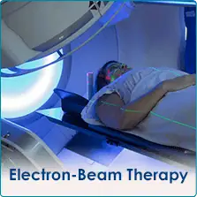 woman gets electron beam therapy
